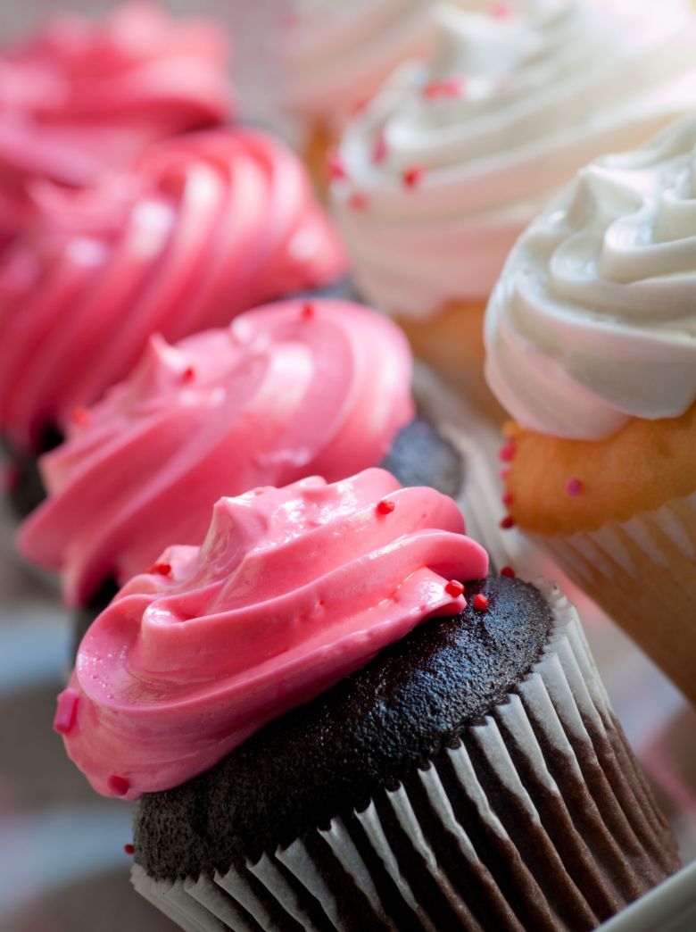 Gourmet cupcake on color backround.